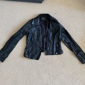 Brandy Melville black leather jacket.
